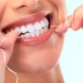 اهمیت استفاده از نخ دندان